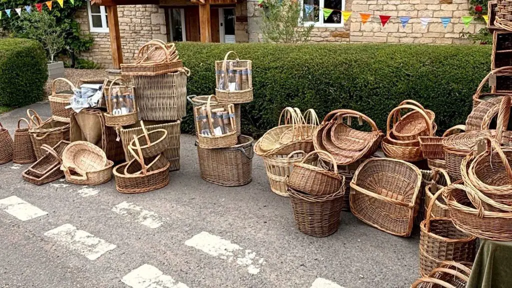 Willow baskets set out along a village street on market day