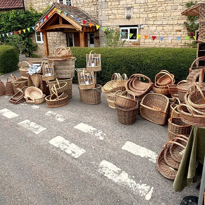 Willow baskets set out along a village street